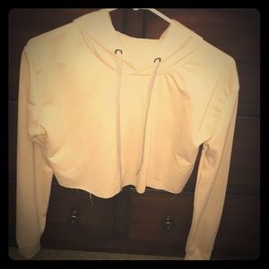 Beige colored crop top hoodie. Never worn!